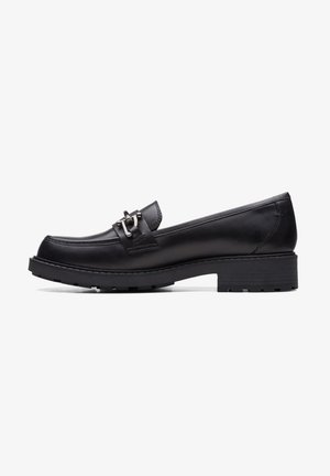 Mocassin en cuir noir avec semelle épaisse et détail argenté sur le dessus, talon bas et bout arrondi, vu de profil.