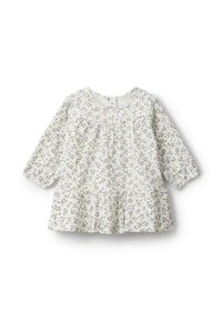 Bílý květinový top s dlouhými rukávy, který má sešitou živůtek a rozšířený lem; celoplošný malý vícebarevný květinový vzor.