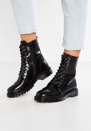 Bottines à lacets - black