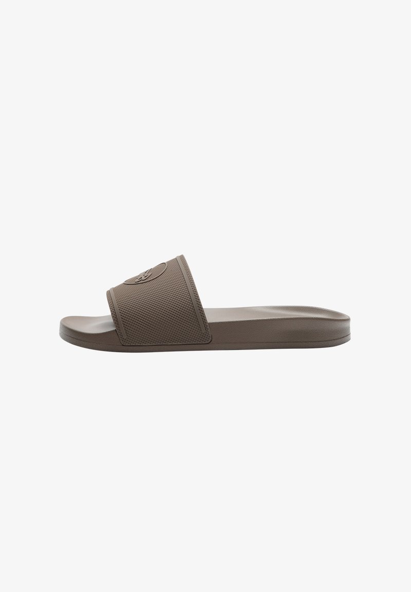 Brown rubber slide sandal with textured strap, featuring a raised logo and a flat sole for comfort. Smooth finish and simple design.