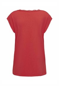 Červené tričko s krátkým rukávem a kulatým výstřihem, s krajkovým lemem na zadní straně. Vyrobeno z měkké tkaniny, má volný a uvolněný střih.