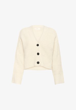 Krémová skrátená cardigan s výstrihom do V, rebrovanou textúrou a štyrmi čiernymi gombíkmi vpredu so zvýrazneným stehom.