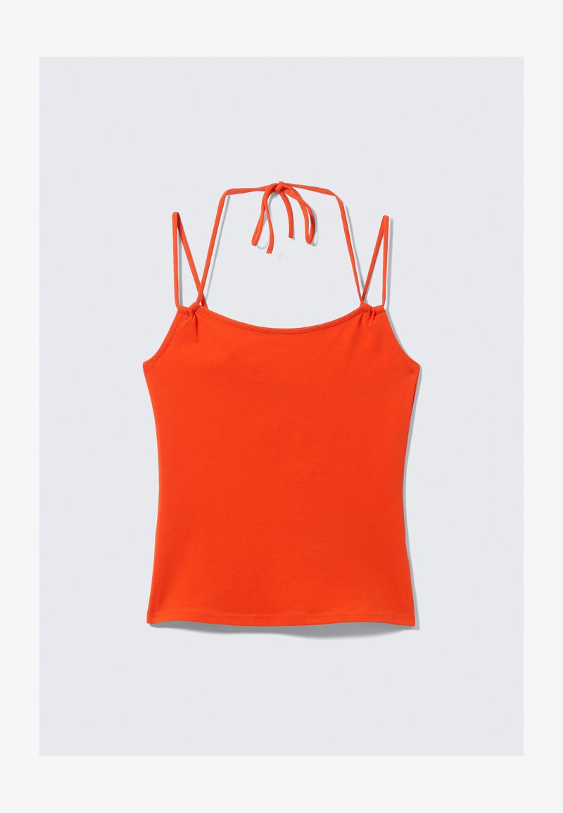 Camisole en coton orange avec bretelles réglables, dotée d'un col arrondi et d'une coupe ajustée. Sans motifs ni ornements.