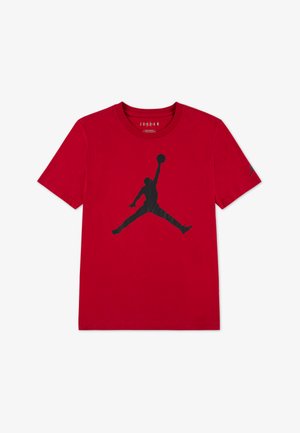 T-shirt rossa in cotone con un grande logo Jumpman nero stampato al centro. Design con collo tondo standard, maniche corte e senza motivi visibili.
