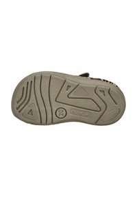 Beige Schuhsohle aus strukturiertem Gummi, mit einem dreieckigen Profilmuster und Markenlogo. Leicht erhöhte Ränder für besseren Halt.