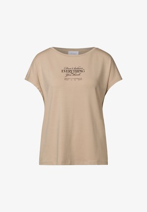 Maglietta in cotone beige con maniche corte, scollatura rotonda e testo stampato sul davanti in nero. Design semplice, vestibilità comoda e texture morbida.