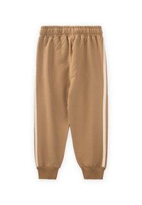 Beige Baumwoll-Sweatpants mit elastischem Bund, gerippten Bündchen und weißen Seitenstreifen. Glatte Textur, lässiges Design und schmal zulaufender Schnitt.
