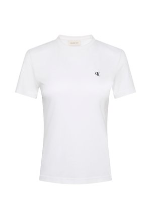 Valge lühikeste varrukatega T-särk pehmest kangast, ümmarguse kaelusega. Vasakul rinnal on väike must "ck" logo. Klassikaline lõige.