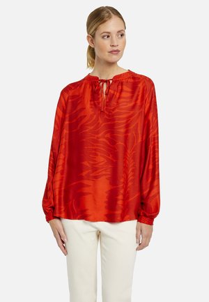 Camicetta - orange print