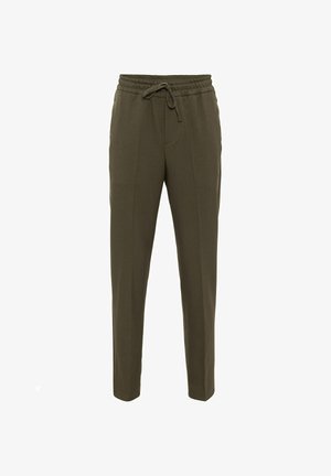Pantalon fuselé vert olive avec taille élastique et cordon de serrage, doté de deux poches latérales et d'une finition en tissu lisse et extensible.
