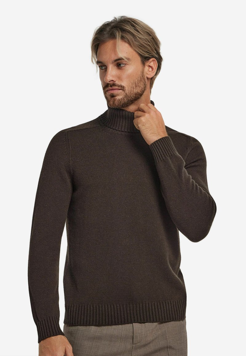 Brauner Rollkragenpullover aus strukturiertem Strickstoff, mit gerippten Bündchen und Saum, in einer taillierten Passform und leicht elastisch.