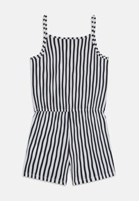 Combinaison rayée en blanc et bleu marine, avec des bretelles fines, une coupe décontractée et une taille élastique. Fabriquée en tissu doux.