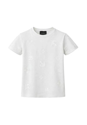 T-shirt bianca a maniche corte con sottili motivi in rilievo che includono fiori e le lettere J e R sparse sul tessuto.