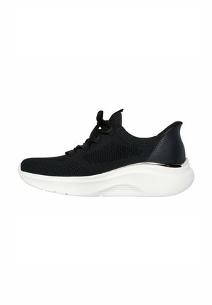 Black athletic shoes with a mesh upper, lace-up design, and textured accents. Features a white cushioned sole and metallic detailing at the heel.