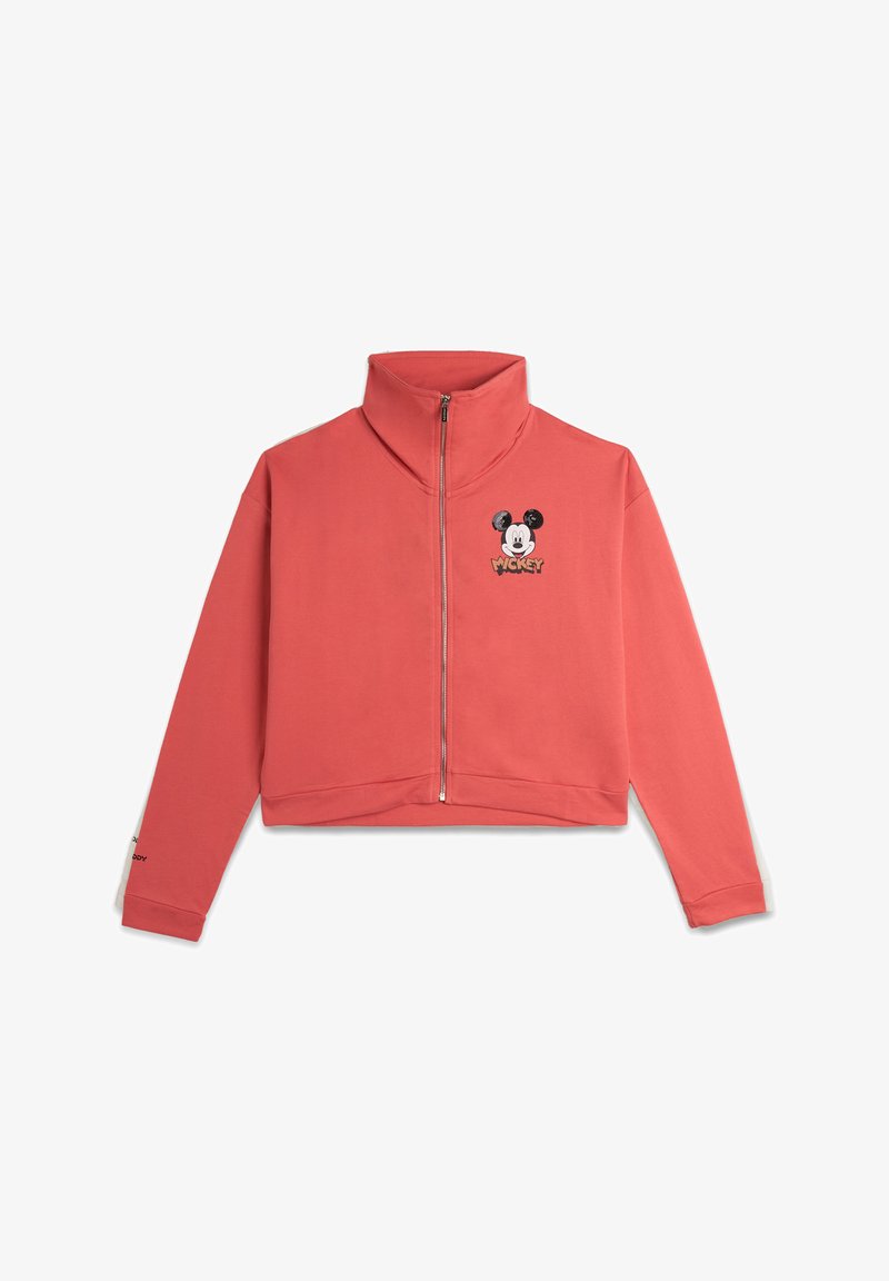 Sweatshirt court corail avec col haut, fermeture éclair à l'avant et motif brodé de Mickey Mouse en noir et blanc. Tissu doux avec des poignets ajustés.