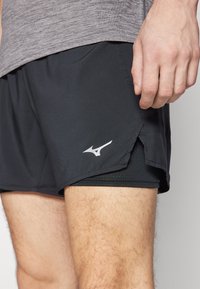 Mizuno CORE SHORT - Pantalón corto de deporte - black