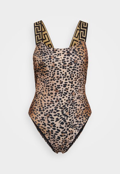 Tīkla druku viengabala peldkostīms ar plašiem melniem siksniņām, kuram ir zelta ģeometriskā raksta dizains. Gluda, spīdīga materiāla sastāvs, V veida kakla izgriezums.