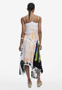 Desigual ASYMMETRIC - Maxikjol - black