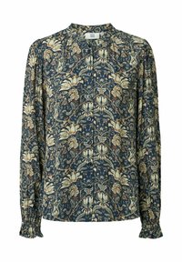 Blouse à manches longues en tissu bleu marine foncé avec un motif floral en crème, or et rouille. Présente une fermeture par boutons et des poignets froncés.