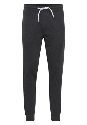 Dark gray sweatpants made of soft fabric, featuring a white drawstring, tapered ankles, and a simple design without pockets.