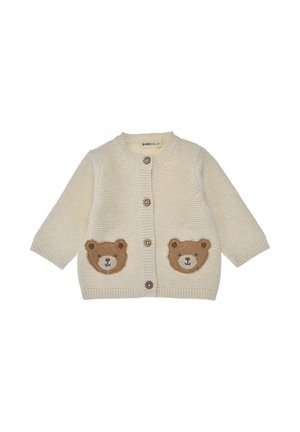 Cream-colored knitted baby cardigan with long sleeves, wooden buttons, and two brown bear face patches on front pockets.