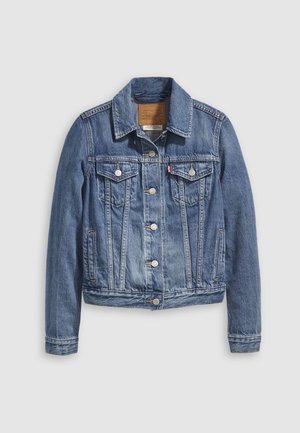 Jeansjacka i medelblå färg med klassisk krage, knäppning fram, två bröstfickor och guldfärgad metall. Sliten texturdetalj.