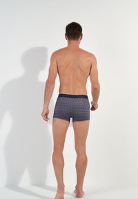 Men's boxer briefs featuring a blue base with a colorful geometric pattern, elastic waistband, and a fitted design.