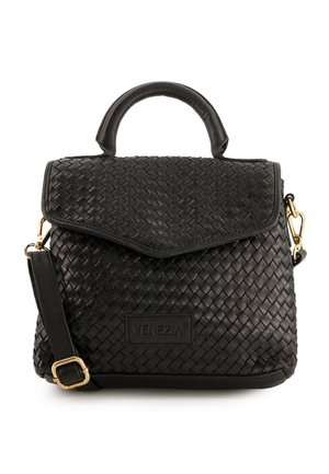Black woven leather handbag with a rounded handle, flap closure, and detachable shoulder strap; features gold-tone hardware and a logo patch.