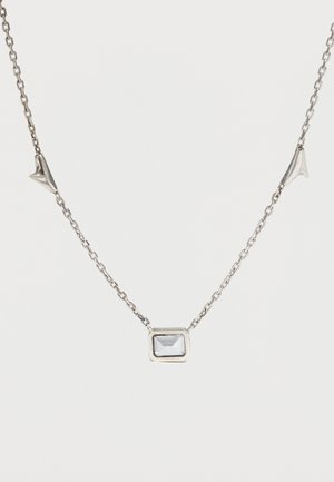 Silver chain necklace featuring a rectangular clear gemstone pendant and two small abstract silver accents along the chain.