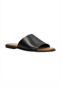 Sandales en cuir noir à semelle plate avec un design à bout ouvert, texture lisse. Semelle intérieure marron contrastante avec un look minimaliste.