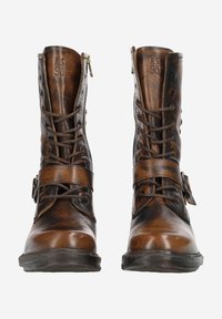 Braune Leder-Stiefeletten mit runder Zehenform, Schnürung vorne und seitlichem Reißverschluss. Mit einem Riemen mit Schnalle im mittleren Bereich.