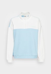 Hellblaue und weiße Pullover-Sweatshirt mit einem halben Reißverschluss-Kragen, präsentiert im Color-Block-Design und mit Roxy-Logo. Weiche Textur, entspannte Passform.