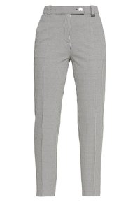 Pantalon ajusté à carreaux noir et blanc avec un devant plat, une coupe slim et une texture de tissu lisse. Il est doté d'un bouton et de passants pour ceinture.