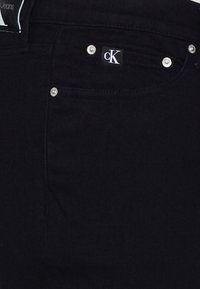 Calvin Klein Jeans Plus Vaqueros pitillo - black denim