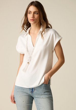 Oltre CON SCOLLO A V - T-shirts basic - bianco