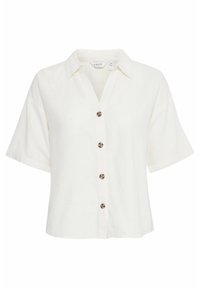 Chemise blanche à manches courtes avec col et quatre boutons marron sur le devant.