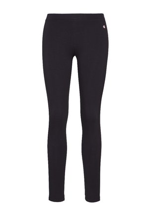 Sorte leggings laget av elastisk stoff. Har en bred elastisk linning og en liten logo på øvre venstre side. Glatt tekstur.