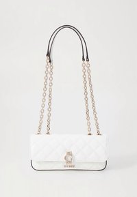 White quilted handbag, featuring a gold-tone logo accent, chain straps, and black trim. Smooth texture with a rectangular shape.