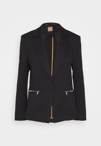 Blazer nero con spalle strutturate, chiusura con un solo bottone, tasche laterali con zip e una fodera interna dorata a contrasto. Tessuto strutturato.