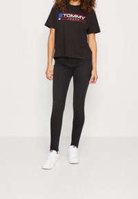 Tommy Jeans Jeans Skinny Fit - black denim