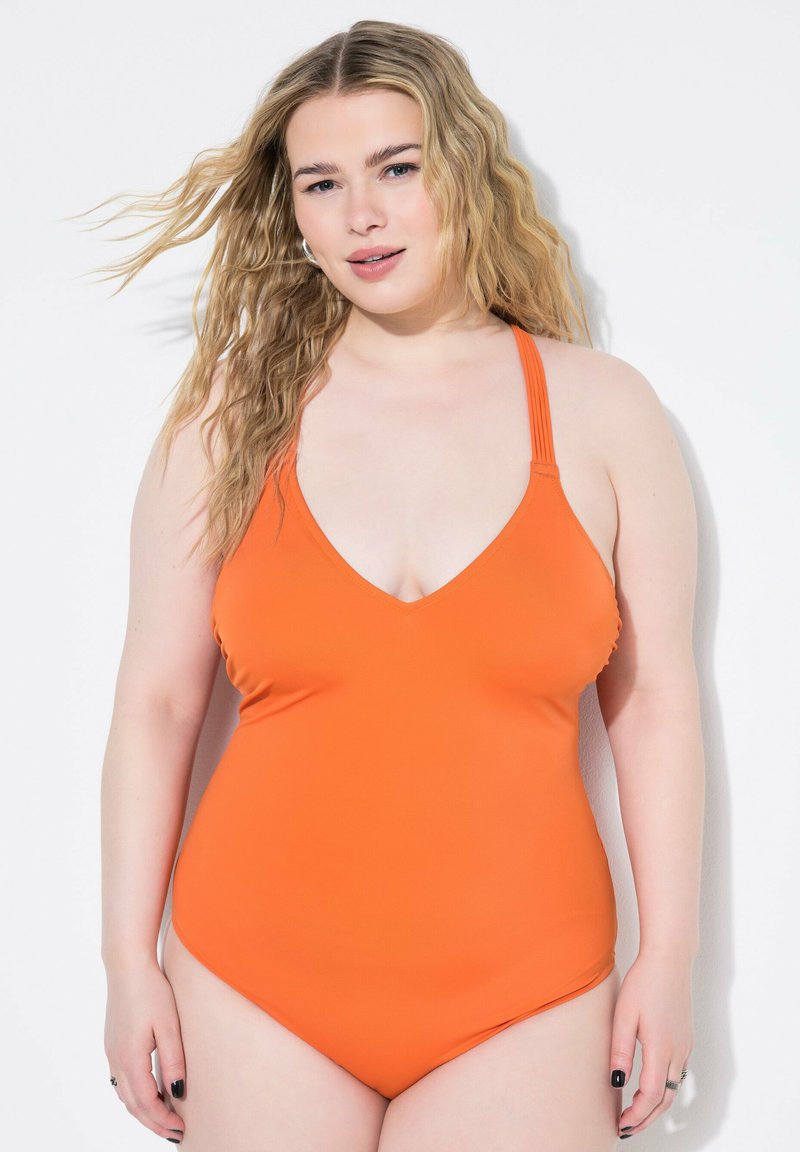 Maillot de bain une pièce orange avec un décolleté en V plongeant et de fines bretelles. Texture lisse et design ajusté, adapté à une variété de types de corps.