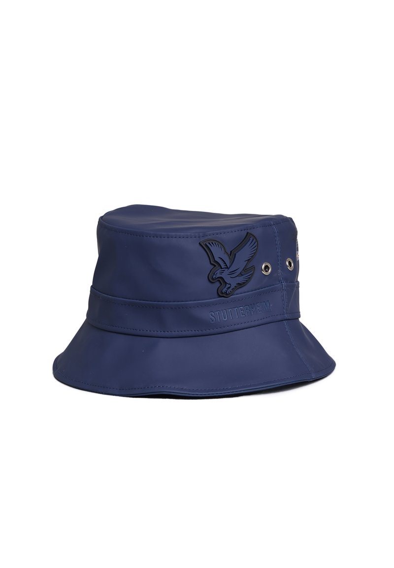 Navyblaue wasserdichte Bucket Hat mit breiter Krempe, mit strukturierter Oberfläche, eingeprägtem Logo und dekorativen Ösen an der Seite.