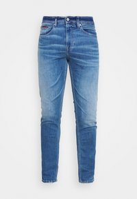 Ljusblå denimjeans i slim fit, med normal midja, fyra fickor och subtila blekningsdetaljer fram.