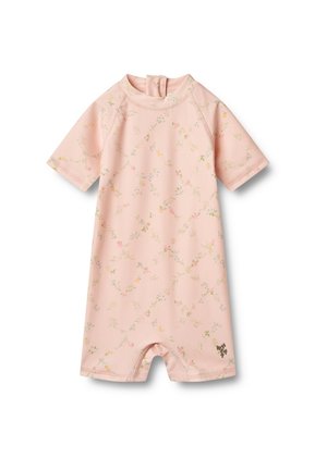 Combinaison rose à manches courtes avec un motif floral, tissu doux, coutures plates et fermeture éclair au cou. Comprend un petit logo sur le côté.