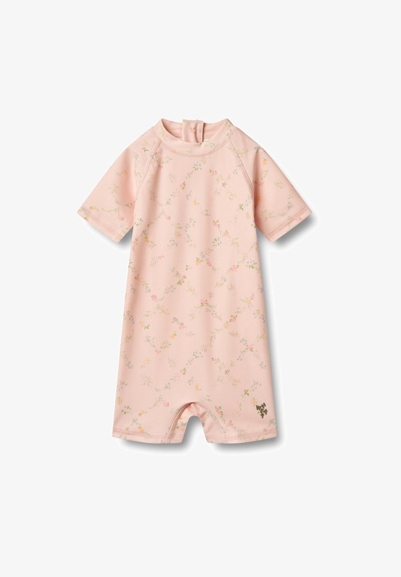 Kortærmet, pink jumpsuit med blomsterdesign, blødt stof, flade sømme og lynlås lukning ved halsen. Har et lille logo på siden.