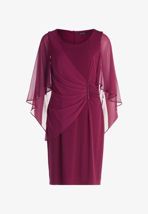 Robe mauve avec des manches fluides en voile, des détails froncés à la taille et un col rond. Se ferme au dos avec une fermeture éclair.