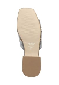 Silver heeled sandal with a textured upper, open back, and a patterned outsole. Features a smooth beige insole and a rubberized heel. Size 37.