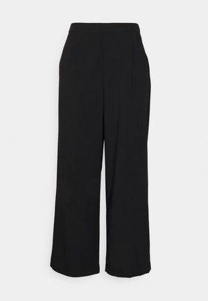 Pantalon noir taille haute à jambes larges, taille ajustée et ourlet droit, présenté sur un fond clair uni.