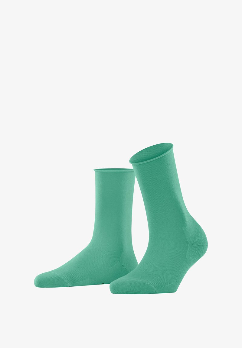 Pair of mint green socks made from a soft, stretchy material. Features a crew length design with ribbed top and reinforced toe.