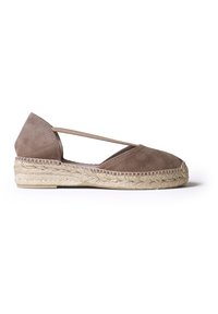 Brown suede espadrille with a rounded toe, strap design, and woven jute sole, featuring a natural texture and a low heel.